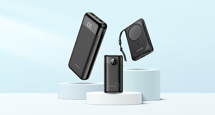 ACMIC power banks and accessories arranged on display podiums